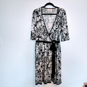 leona edmiston wrap dress, white and black floral pattern with half sleeves and
